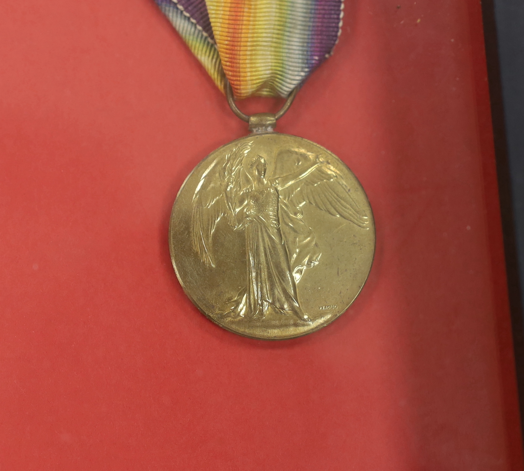 Major Percy Eardley Wilmot, a framed WWI medal group comprising of the War Medal, Victory Medal, 1914/15 Star and military OBE, together with the miniature set